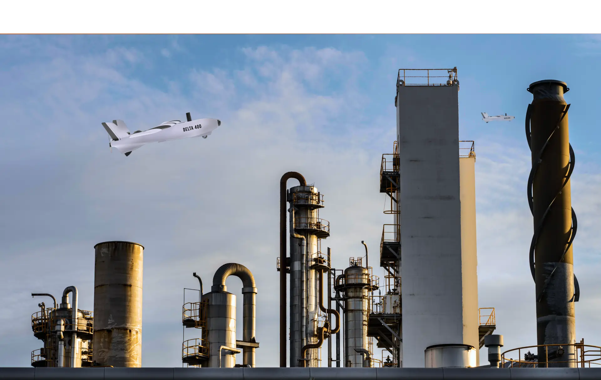 image of kisaan drone spraying chemicals.