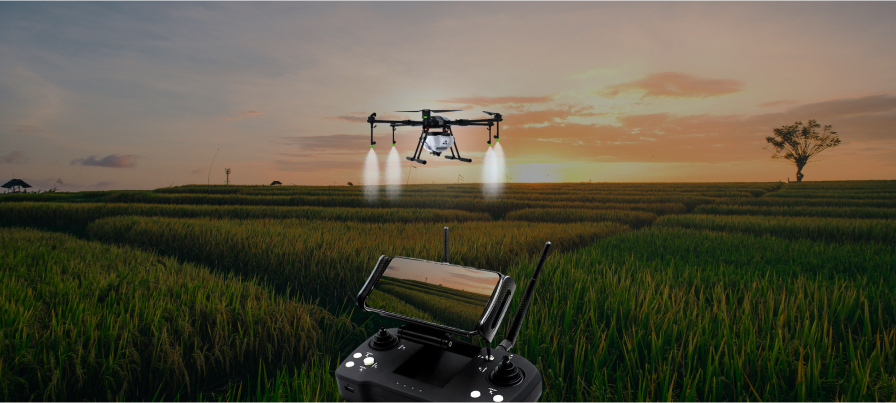 image of kisaan drone spraying chemicals.