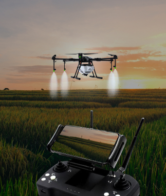 image of kisaan drone spraying chemicals.