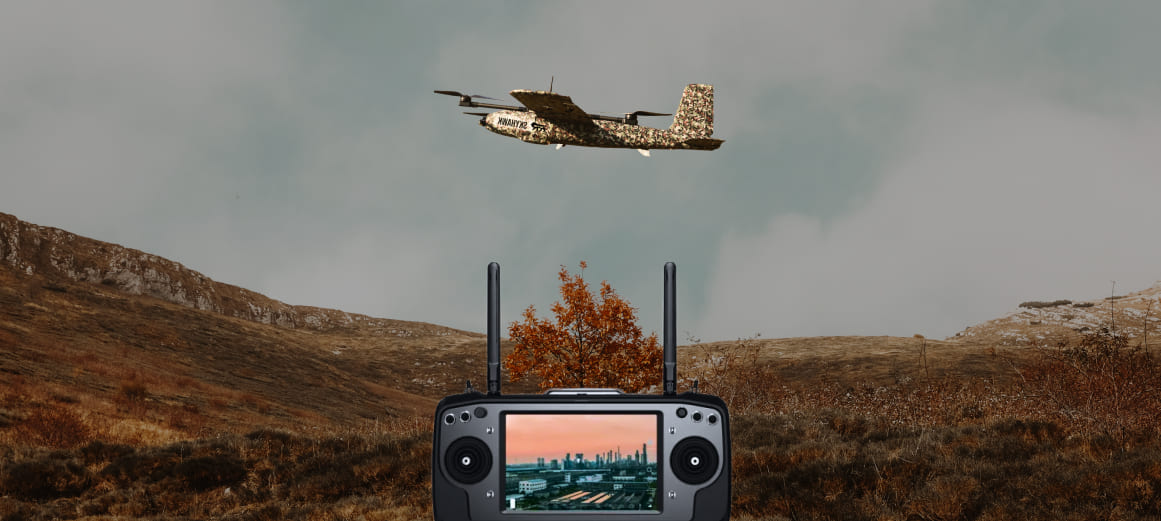 image of kisaan drone spraying chemicals.